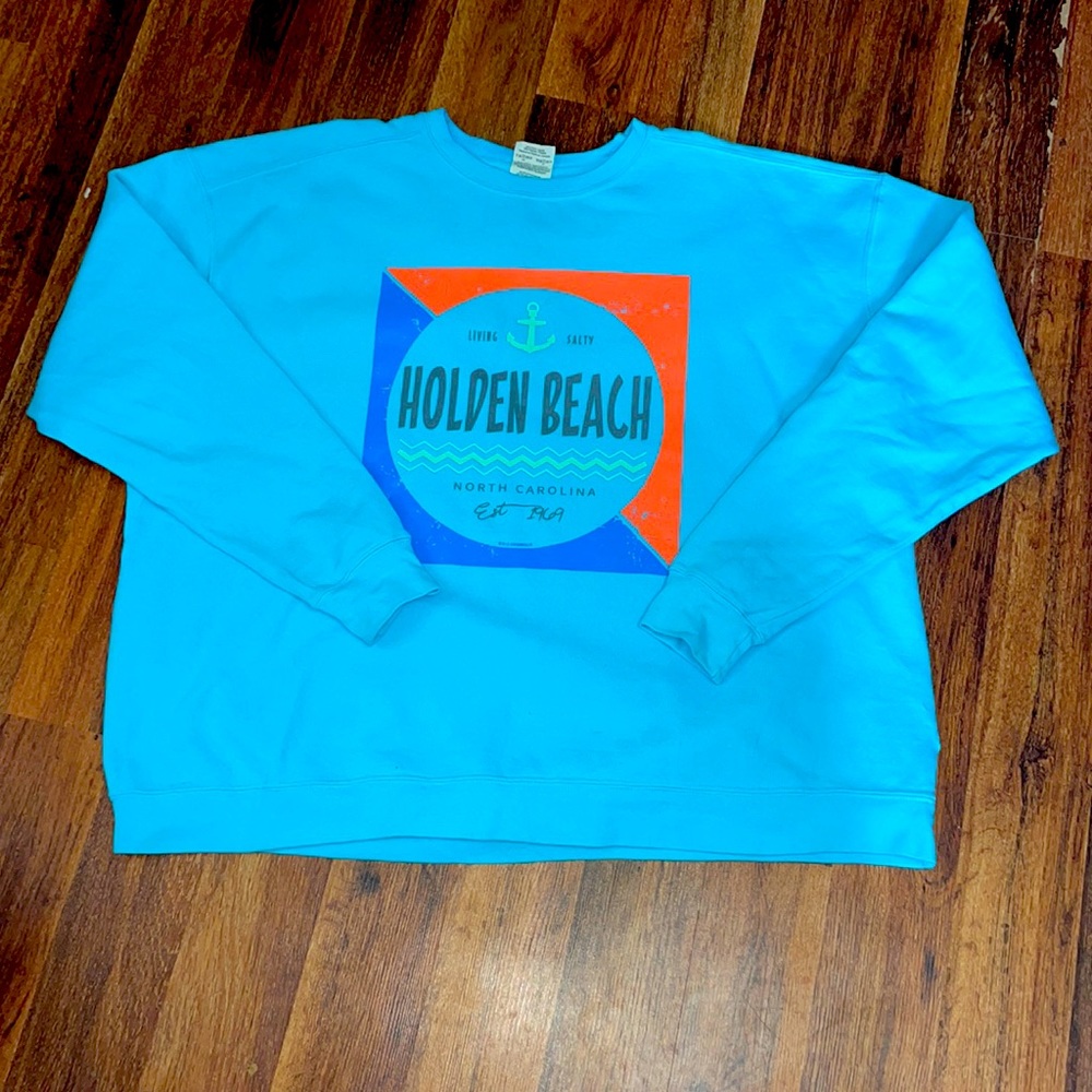 WOMENS PULL OVER. NEVER WORN. PERFECT CONDITION